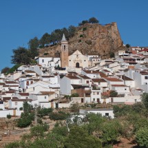 The little mountain village Ardales with its fortress on top of the rock